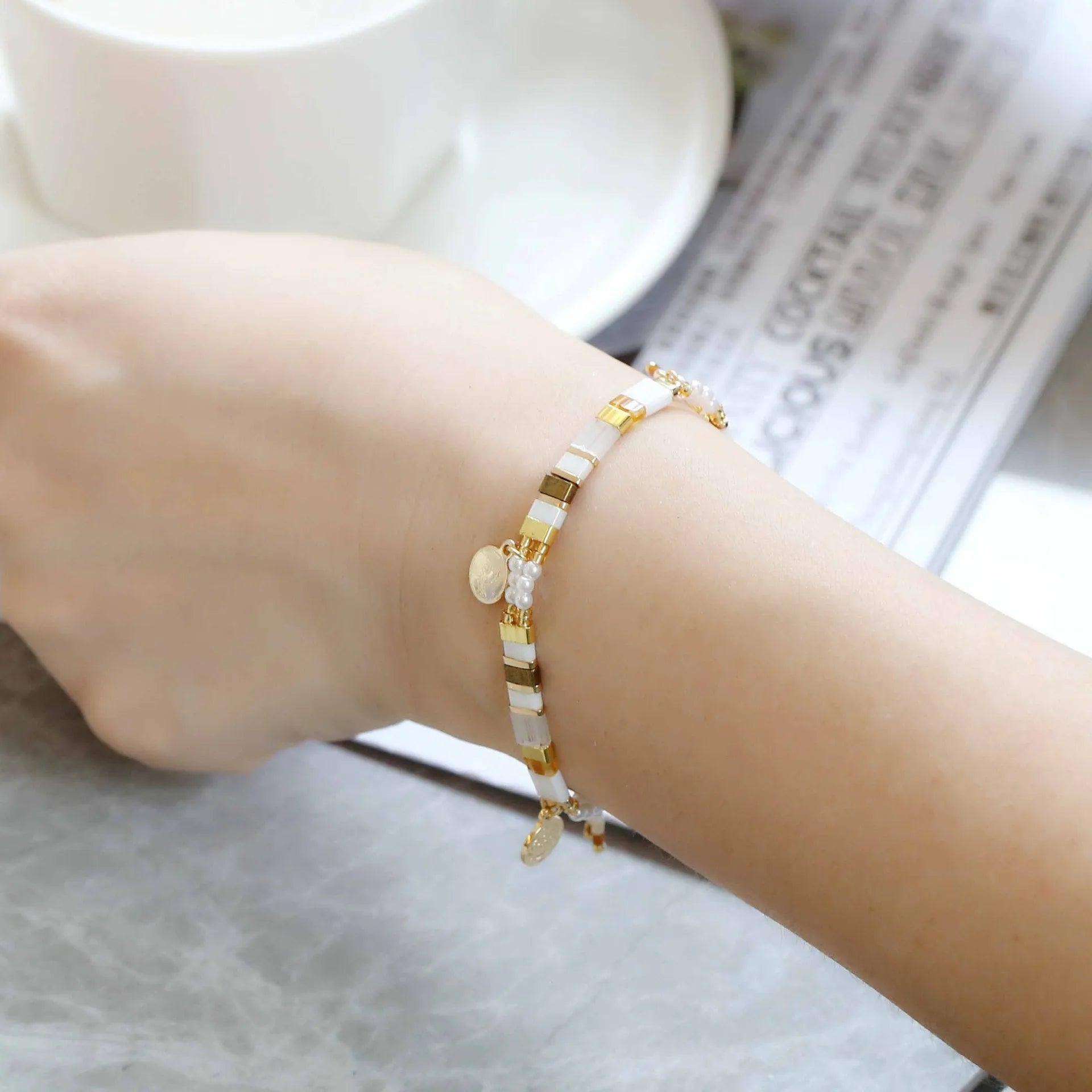 Women's handcrafted beaded bracelet with imitation pearls in original design