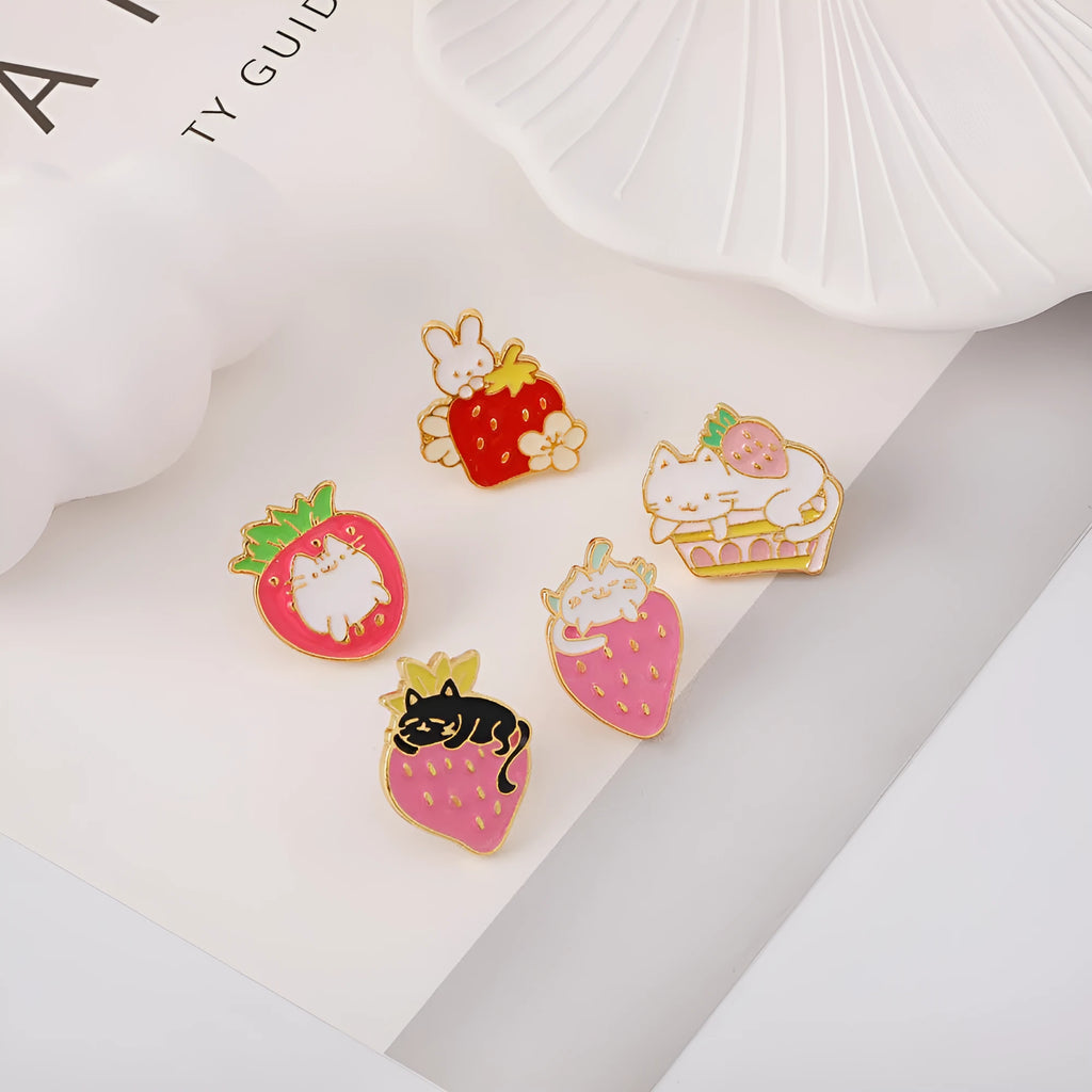 Alloy cake cat brooch with strawberry and dripping oil design in multiple colour options