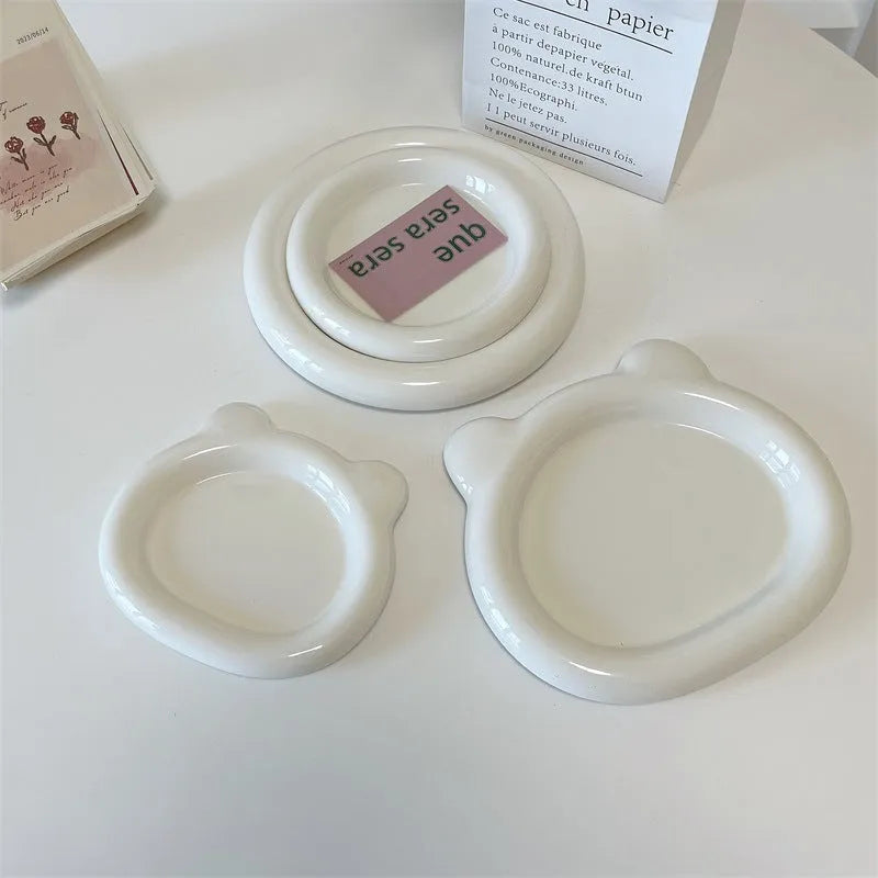 White porcelain plate with bear doodle design, round shape, shown in 15cm and 20cm sizes