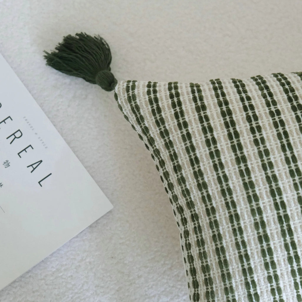 Green decorative hotel pillow set with striped and leafy patterns, shown with a matching pillow core.