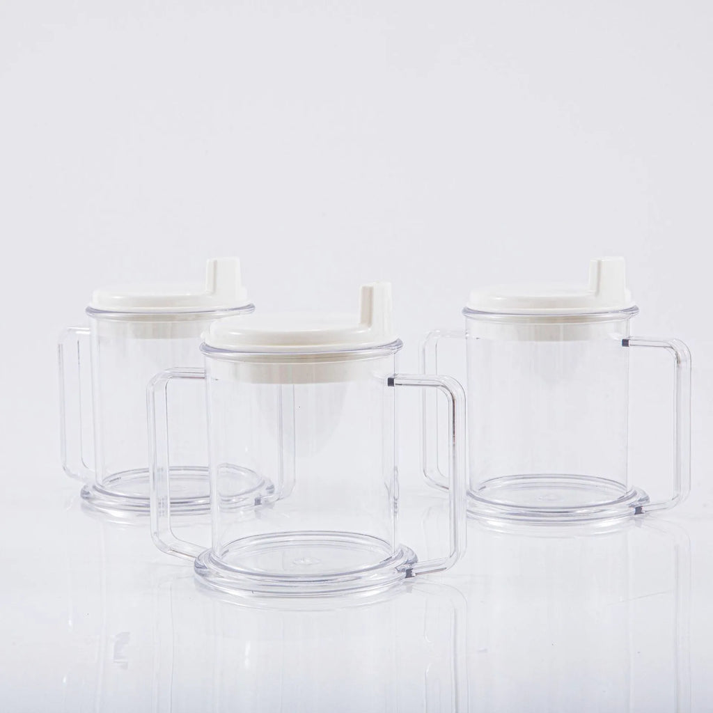 Transparent spill-proof drinking cup with lid showing 14cm height