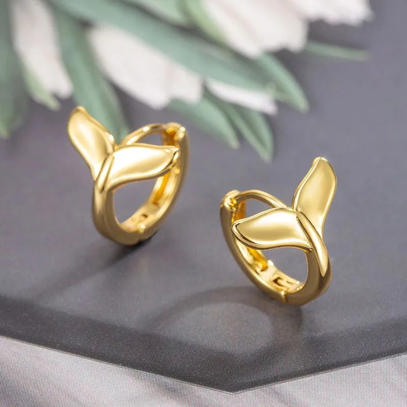 Women's copper fishtail earrings with electroplated white gold or yellow gold finish
