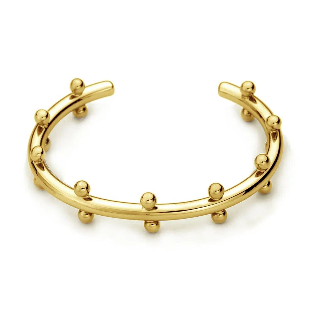 C-shaped stainless steel bracelet charm with textured surface and rivet bean beads in metallic finishes