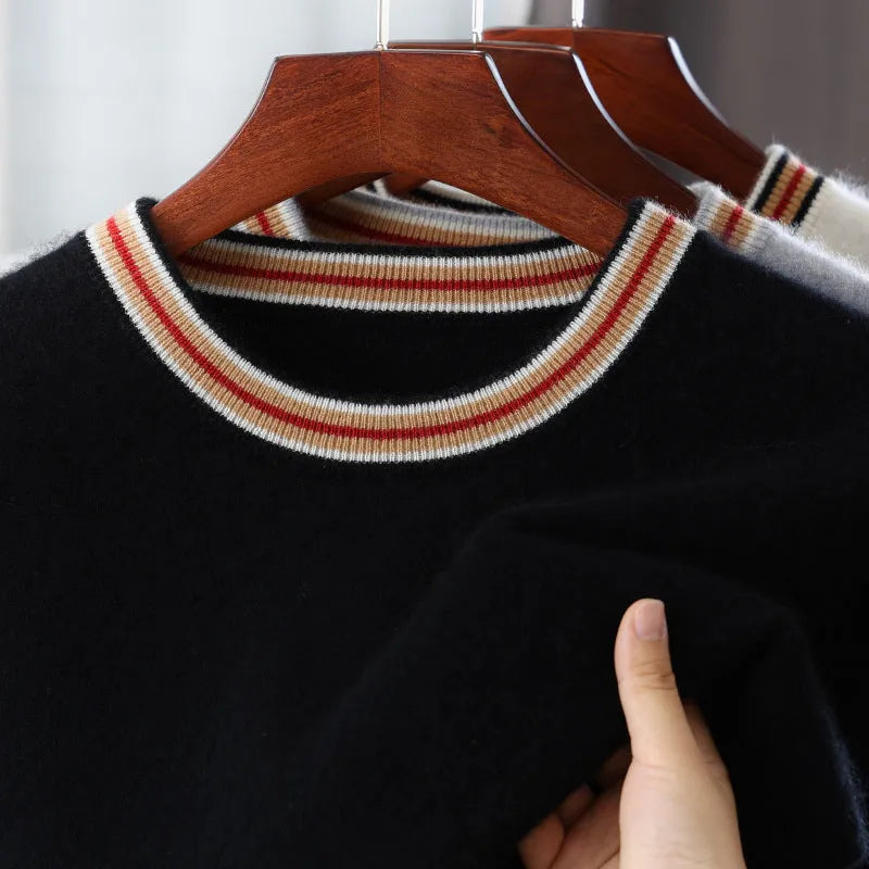 Men's short sleeve pure wool sweater in round neck pullover style on a grey background.