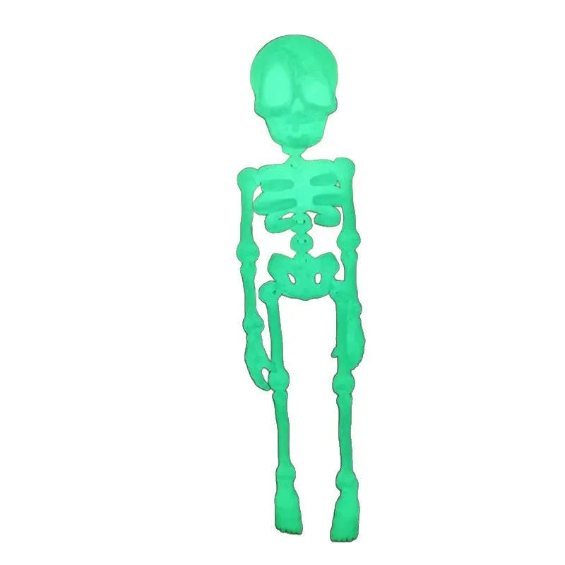Tall 3D printed white skull ornament with intricate detail placed on a refrigerator door.