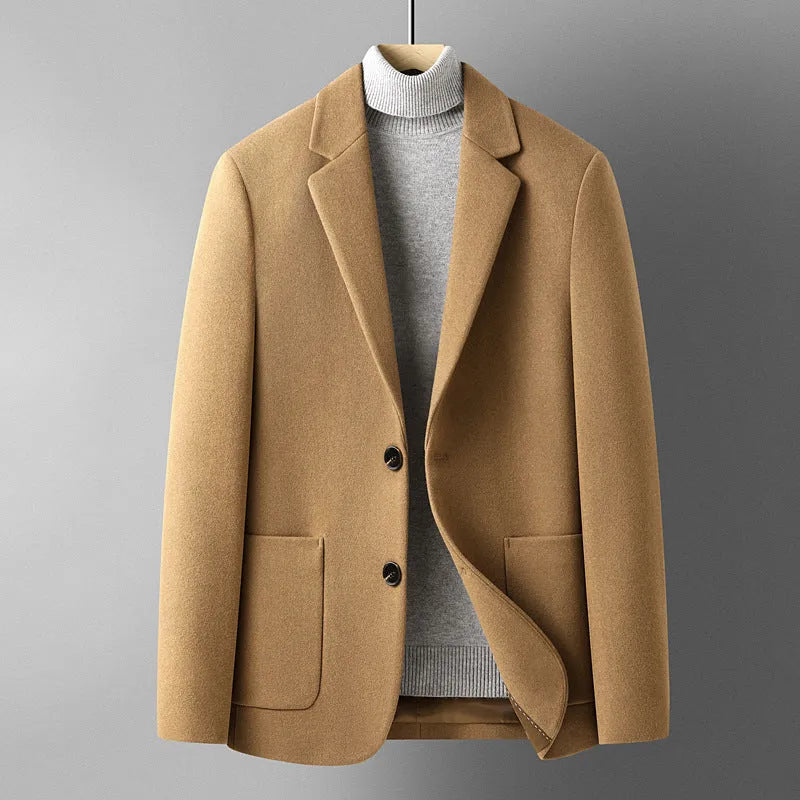 Men's slim fit wool suit jacket in grey, shown on a model, suitable for autumn and winter.