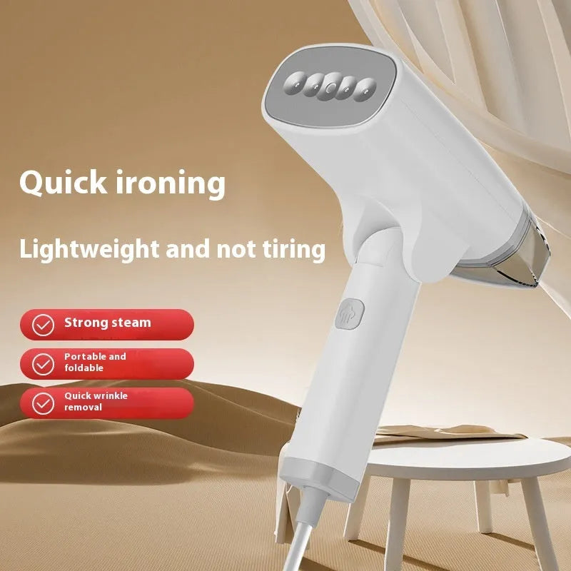 Blue and white handheld garment steamer with water tank and power cord.