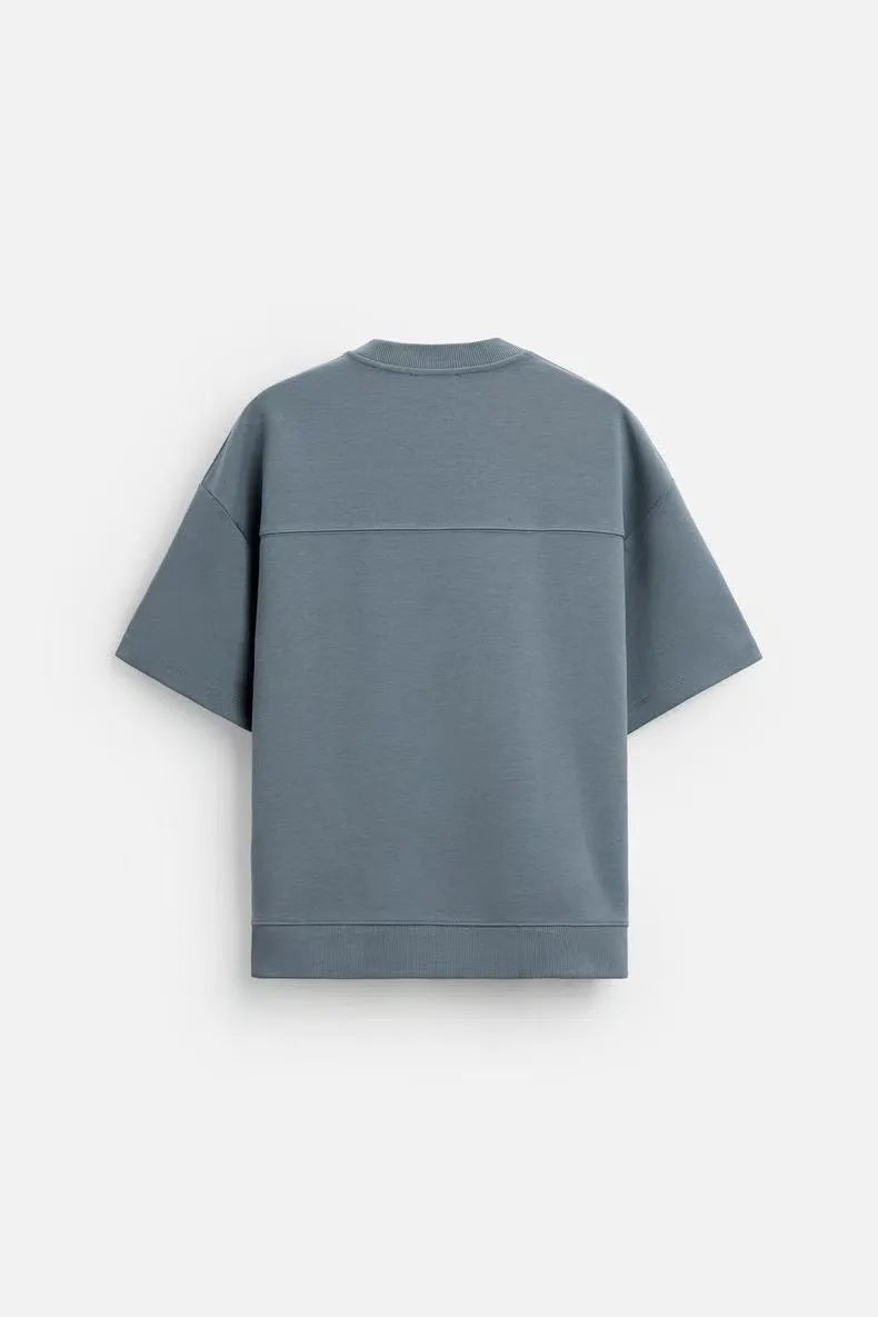 Loose-fit textured polyester short sleeve shirt and matching shorts set on a hanger, shown in a blue colour combination.