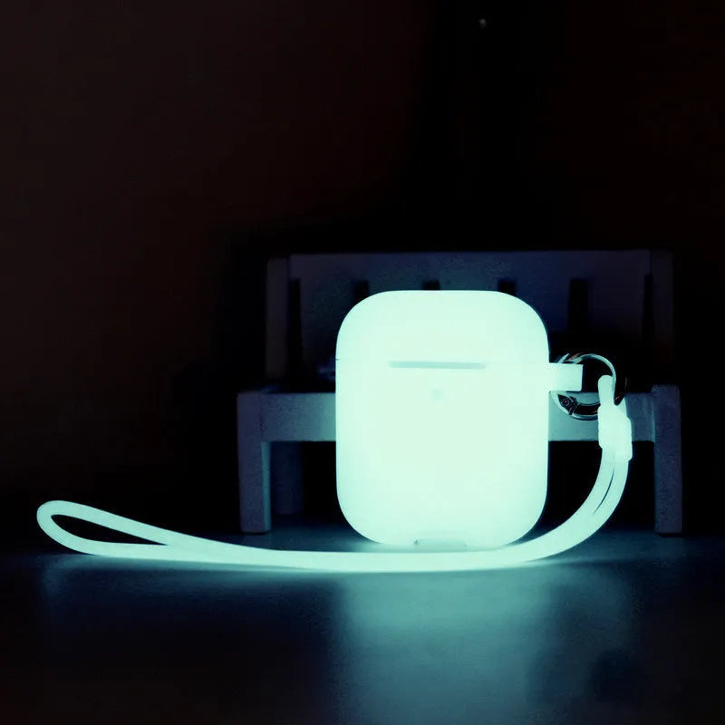 Luminous blue silicone flip case for Apple AirPods with an optional hanging strap attached.
