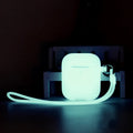 Luminous blue silicone flip case for Apple AirPods with an optional hanging strap attached.