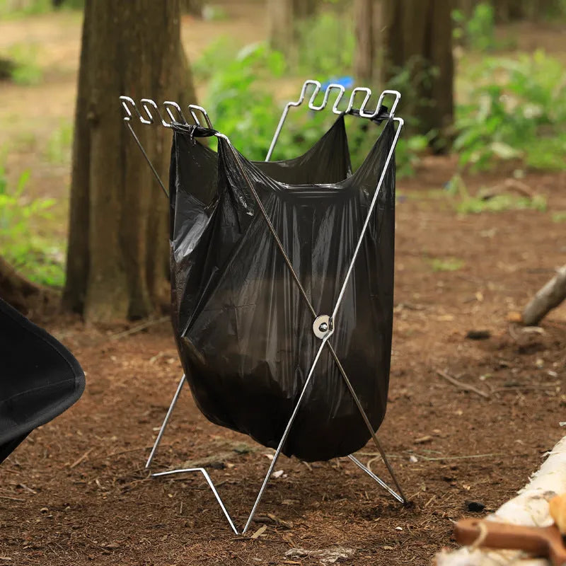Silver stainless steel folding garbage bag bracket holding black bin bag for outdoor use