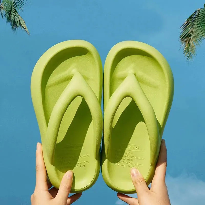 Solid colour EVA thong sandals with a thick sole and a decorative bow on the strap.
