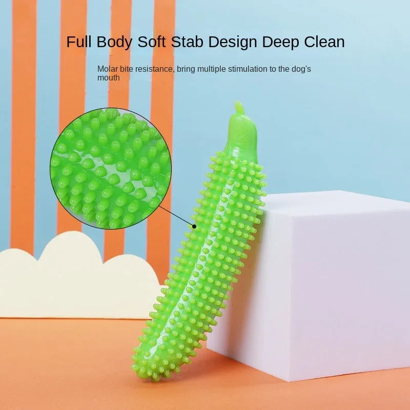 Green cucumber-shaped dog chew toy for teething and interactive play.