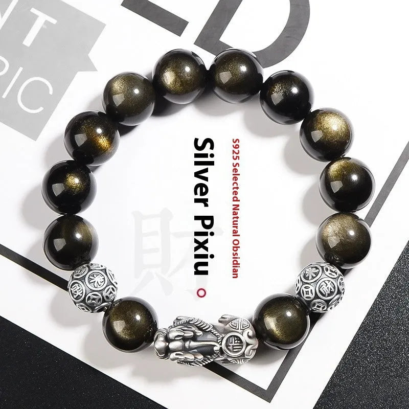 Men's sterling silver and obsidian bracelet with geometric design on a brown leather band.