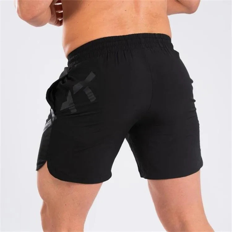 Men's black quick-dry nylon running shorts with mid-length cut for summer training