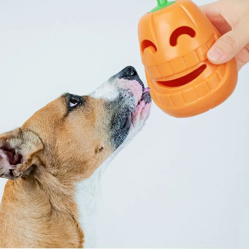 Yellow pumpkin-shaped TPR dog chew toy measuring 8.6x11.5cm