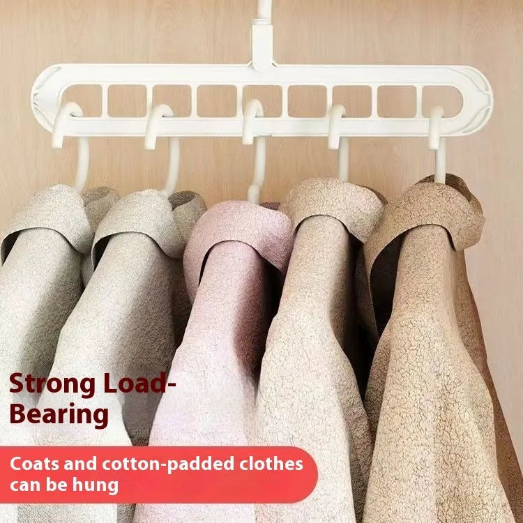 Plastic nine-hole folding clothes hanger for trousers in green, blue, pink, beige, and grey colour options.