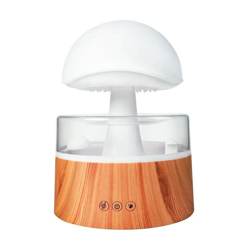 White cloud-shaped humidifier with falling raindrops and colour-changing night light