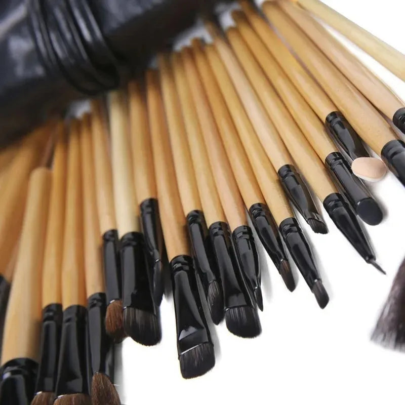 24-piece professional makeup brush set with wooden handles in a black PU gift bag.
