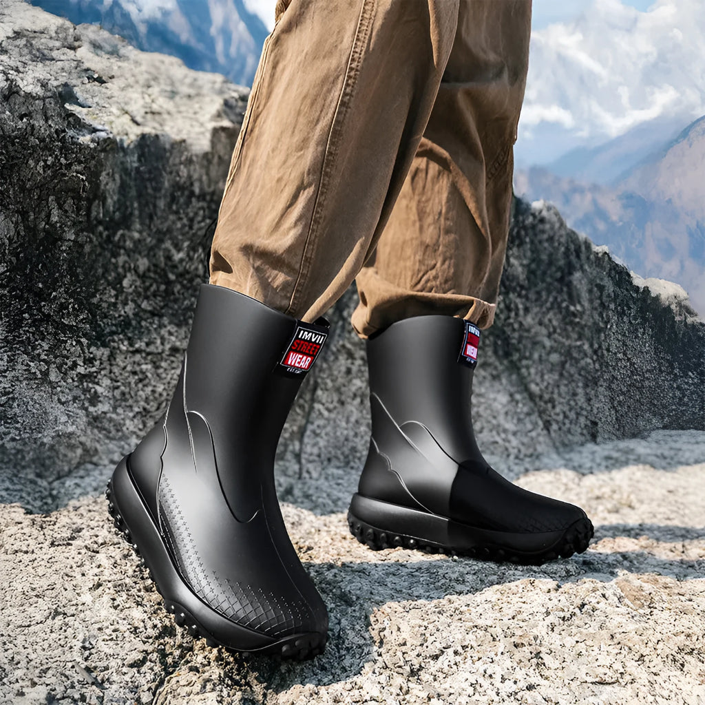 Men's mid tube PVC rain boots in beige colour with round toe and flat heel design