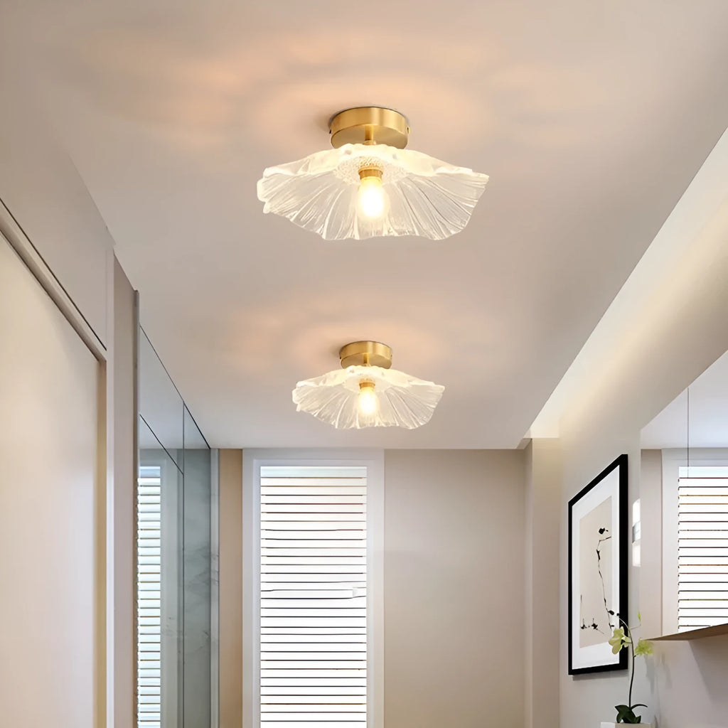 Nordic Japanese style lotus leaf shaped ceiling or pendant lamp with iron frame and glass shade.