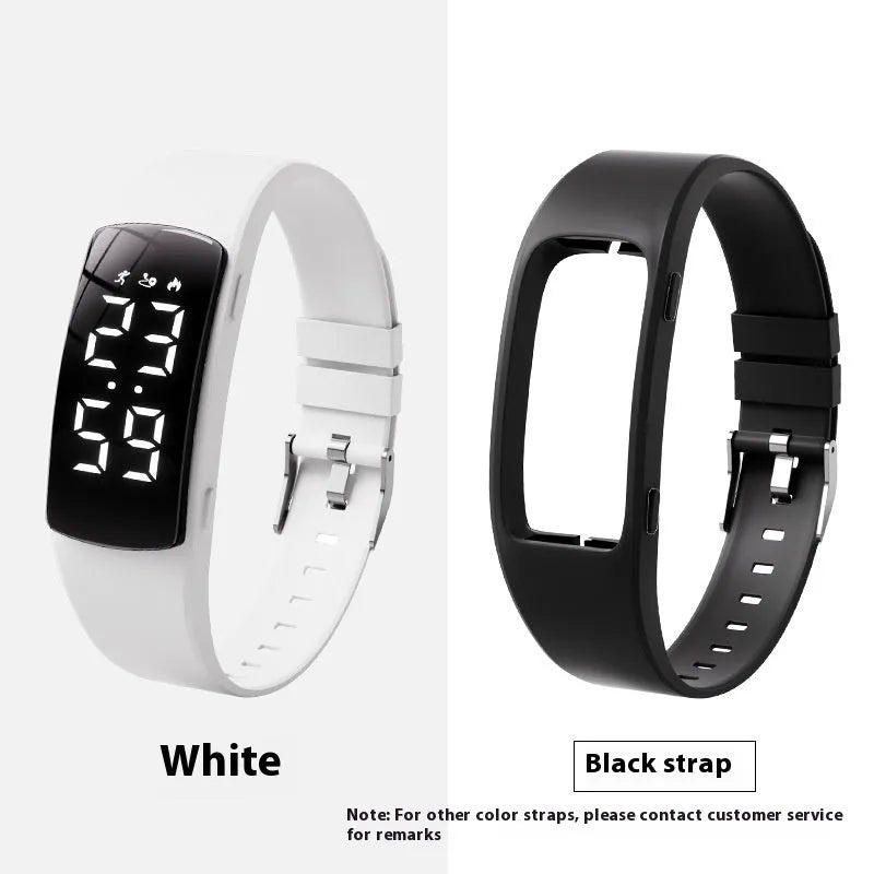 Vibration alarm clock watch with LED display and coloured silicone strap on a wrist.