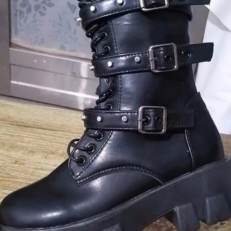 Black women's mid-calf boots with a metal buckle and side zipper on a round toe.