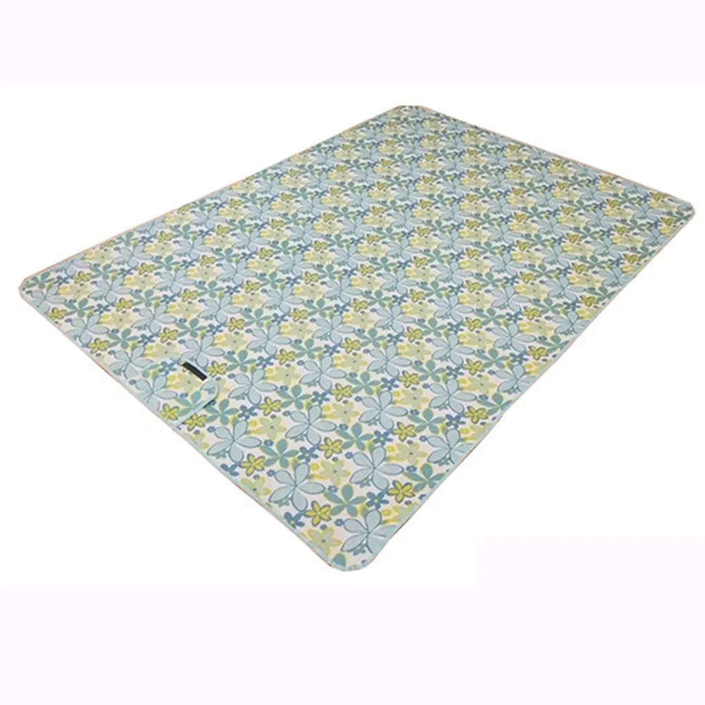 Waterproof acrylic picnic mat in green, red, or blue plaid, 150 x 100cm, with one cushion