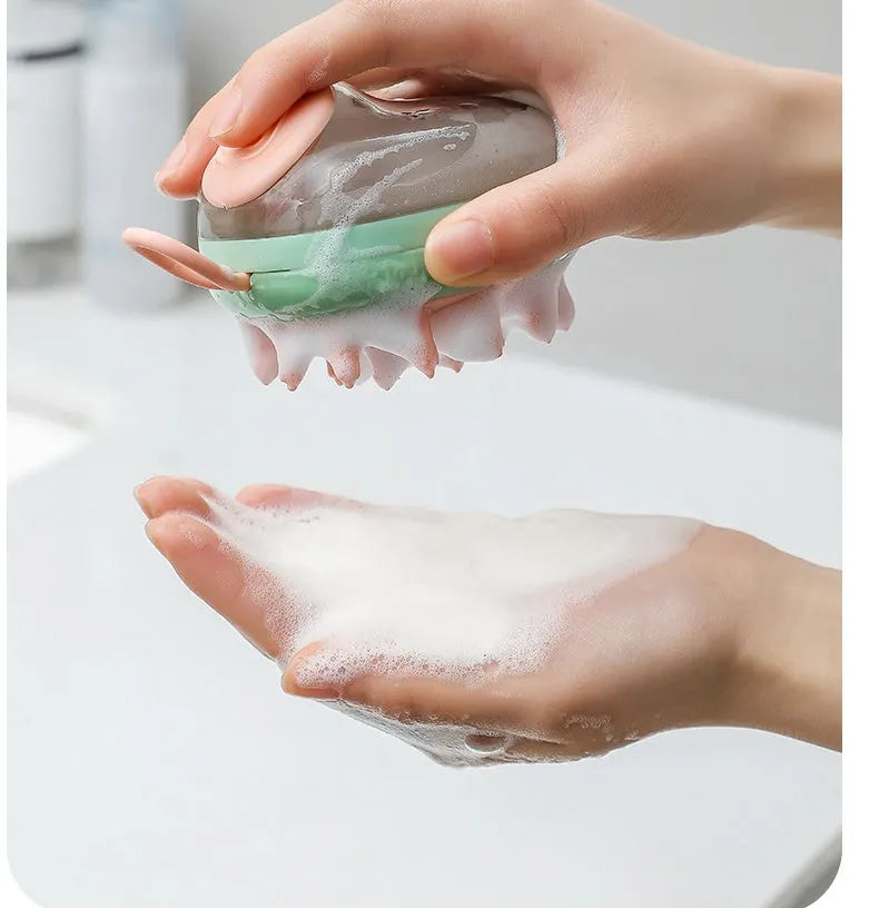 Blue pet grooming brush with soap dispenser and silicone bristles for dogs and cats