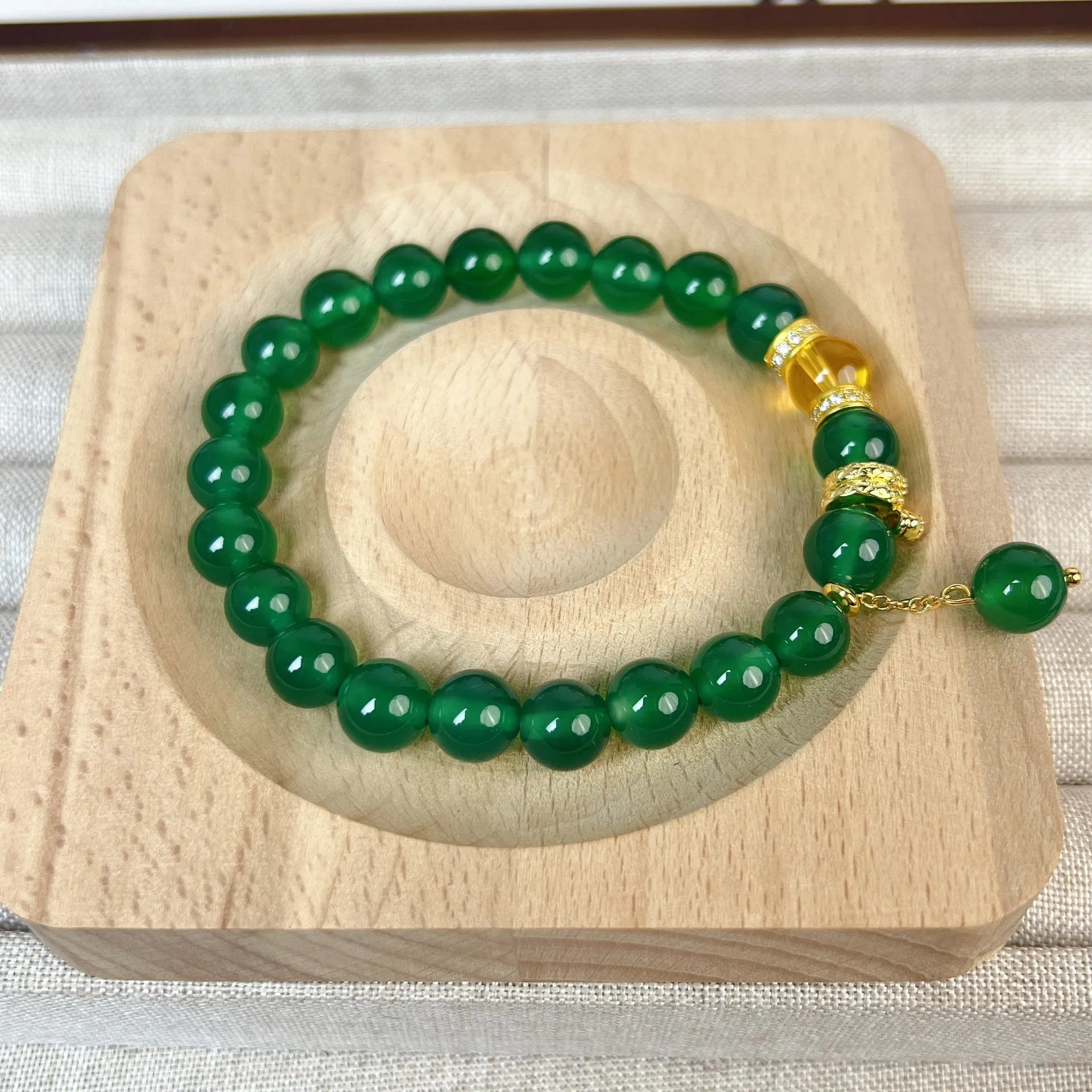 Green chalcedony and red agate wealth snake bracelet with geometric design for unisex wear