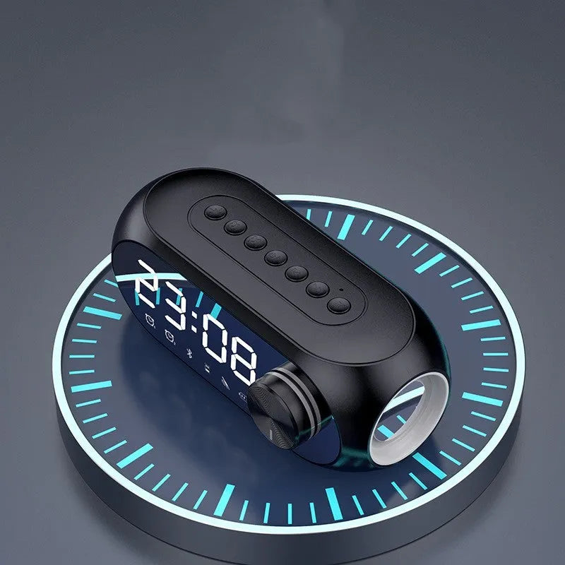 S8 Black portable mini speaker with USB charging cable on a table