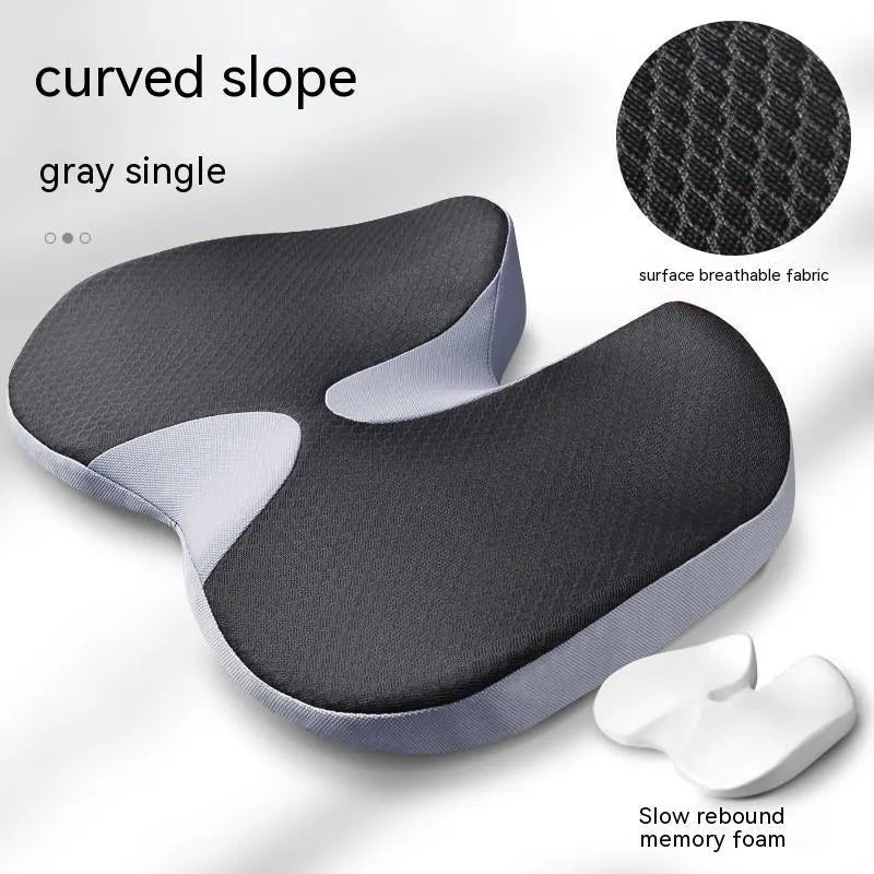 Curved bevel anal support seat cushion in solid colour on a car seat.