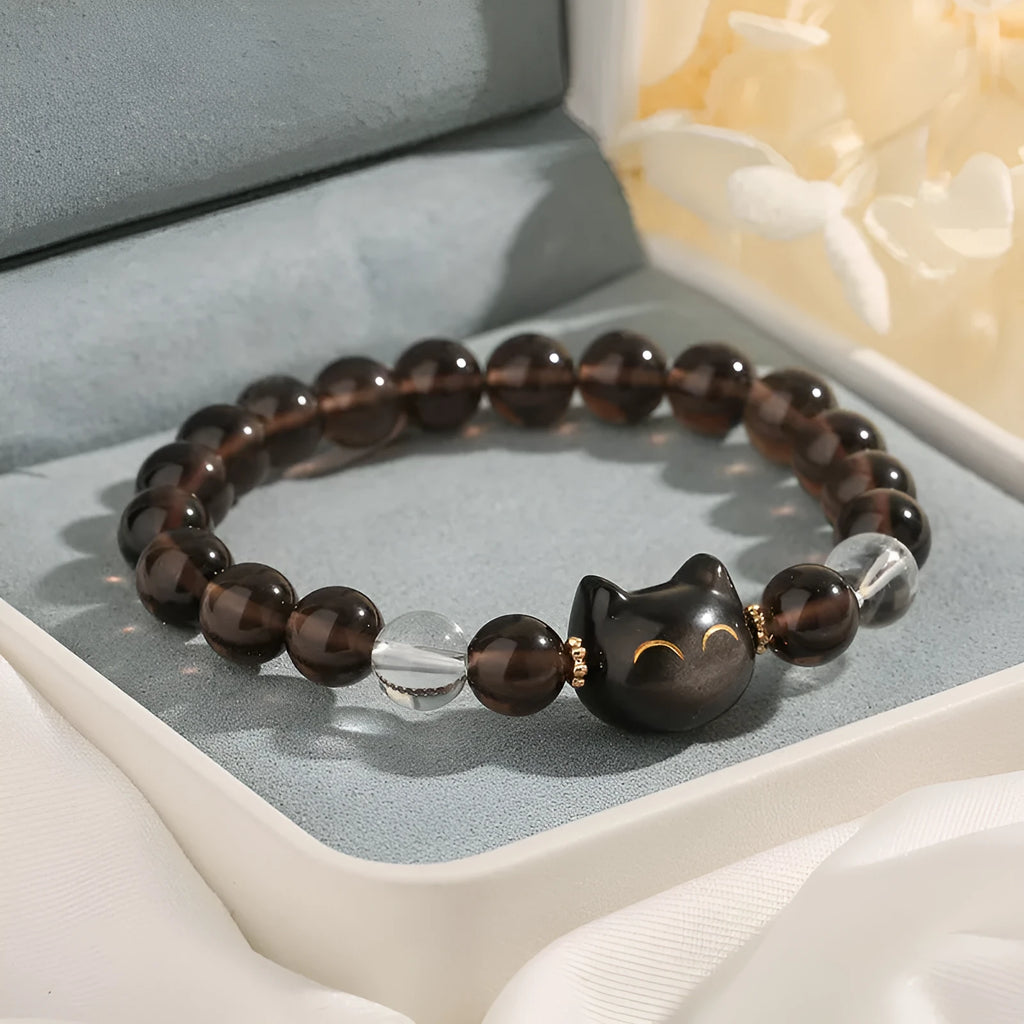 Women's cat head charm bracelet with 8mm Ice Stone on natural silver stone setting.