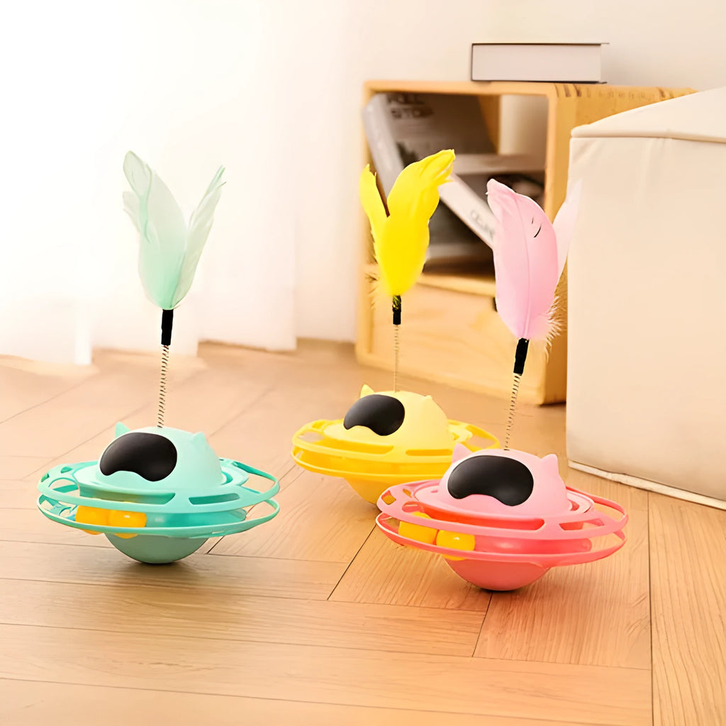 Pink cat tumbler turntable toy with self-moving rotational action for interactive feline play