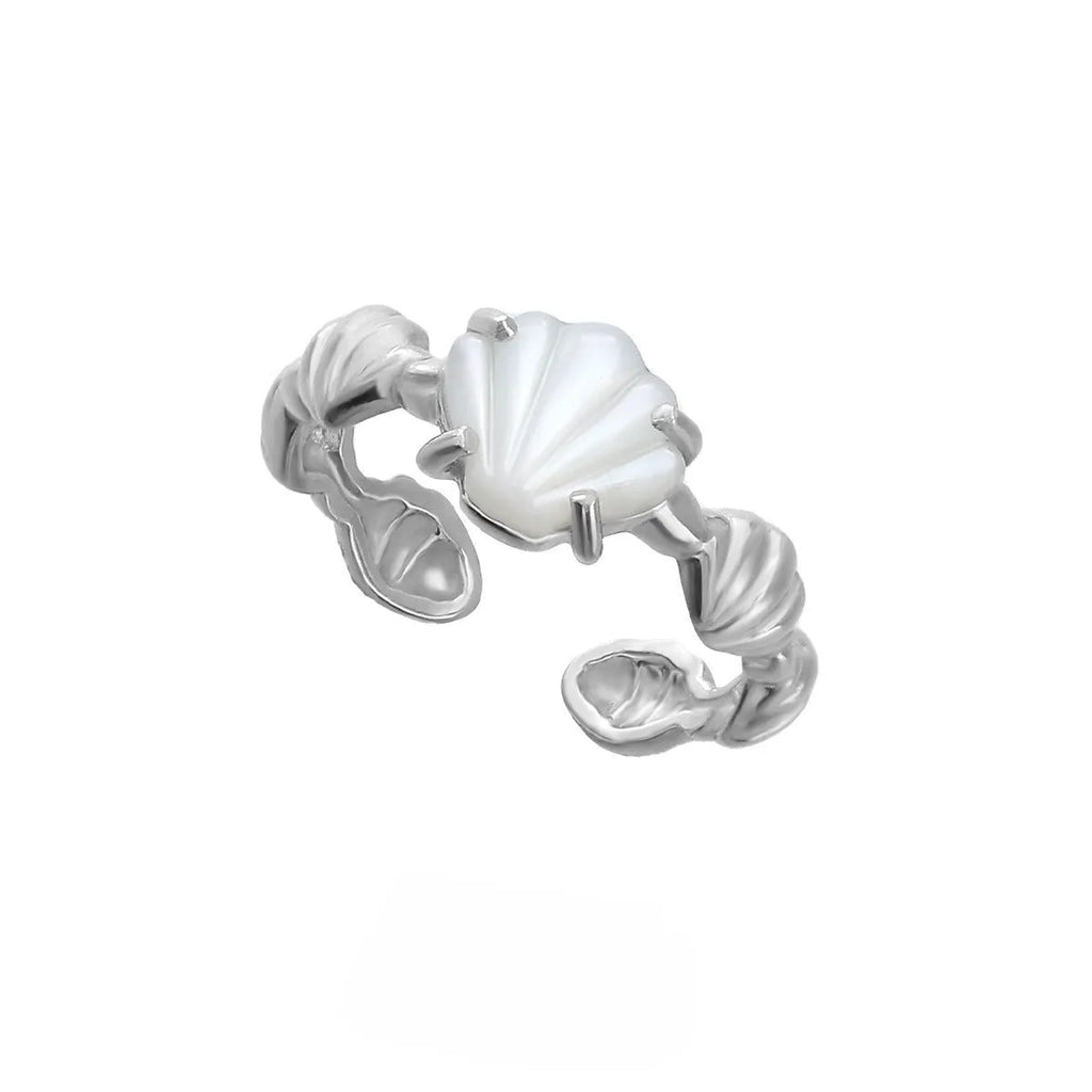 Women's silver ring with shell design and Tiger Eye stone on an adjustable band.