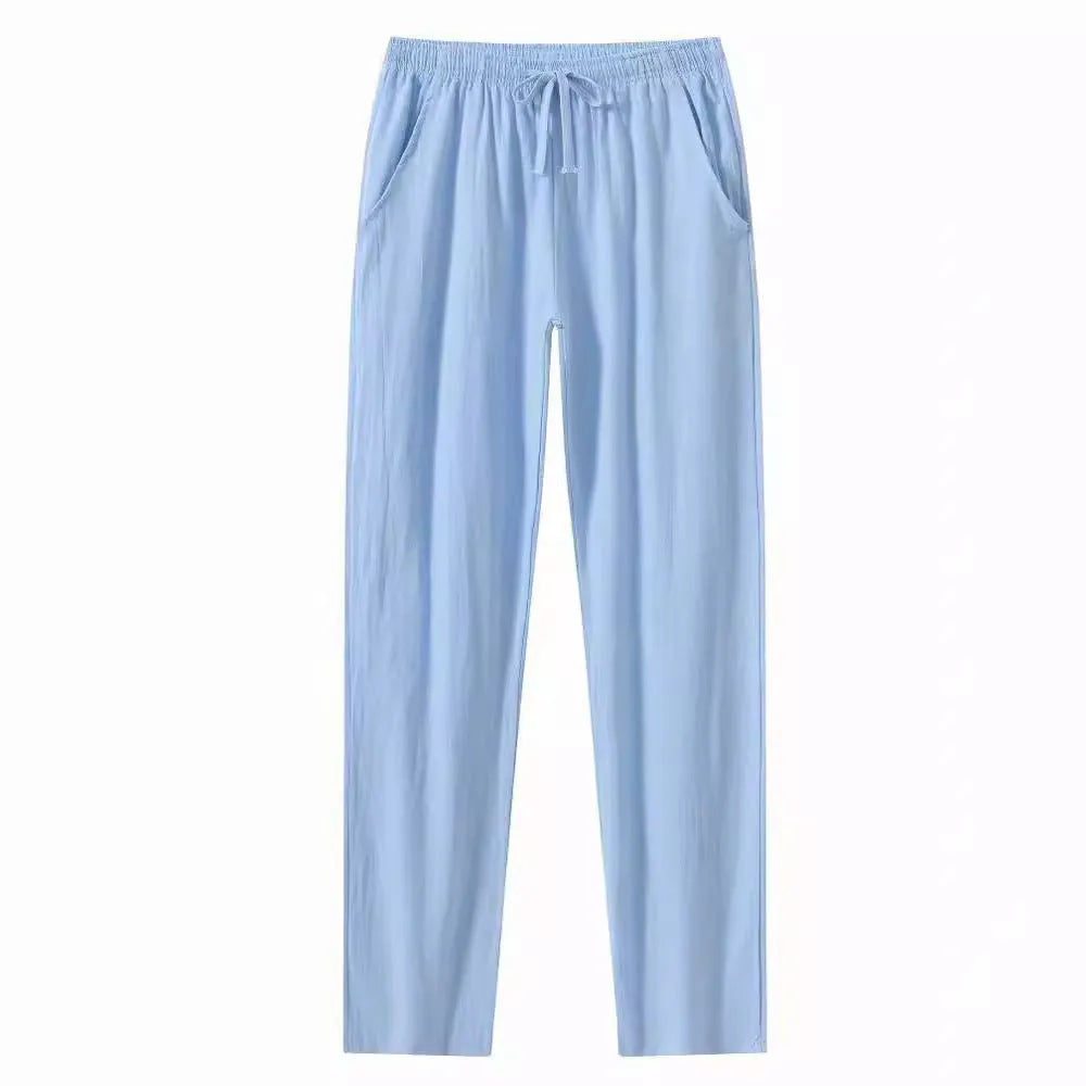 Men's cotton beach pants in loose casual fit showing solid colour options