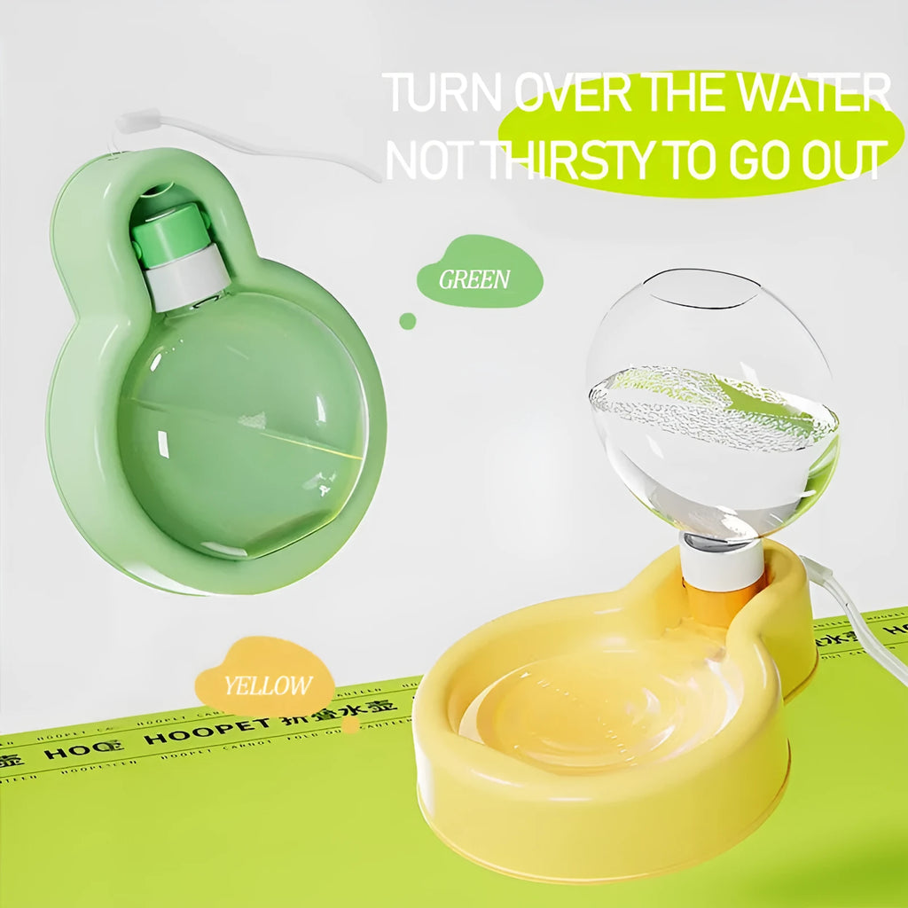 Green portable dog travel cup with pull-out water bowl and bottle handle.