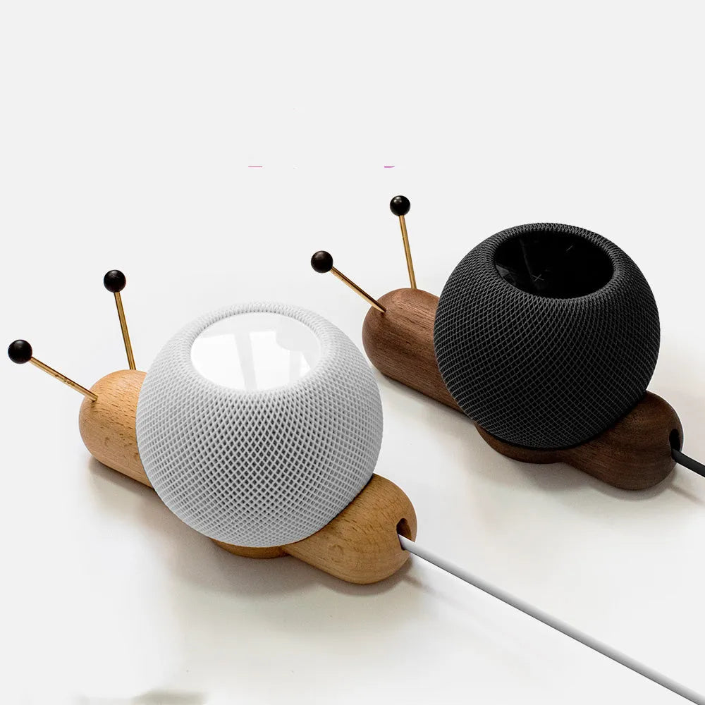 Coffee coloured non-slip desktop bracket for Apple HomePod speaker.