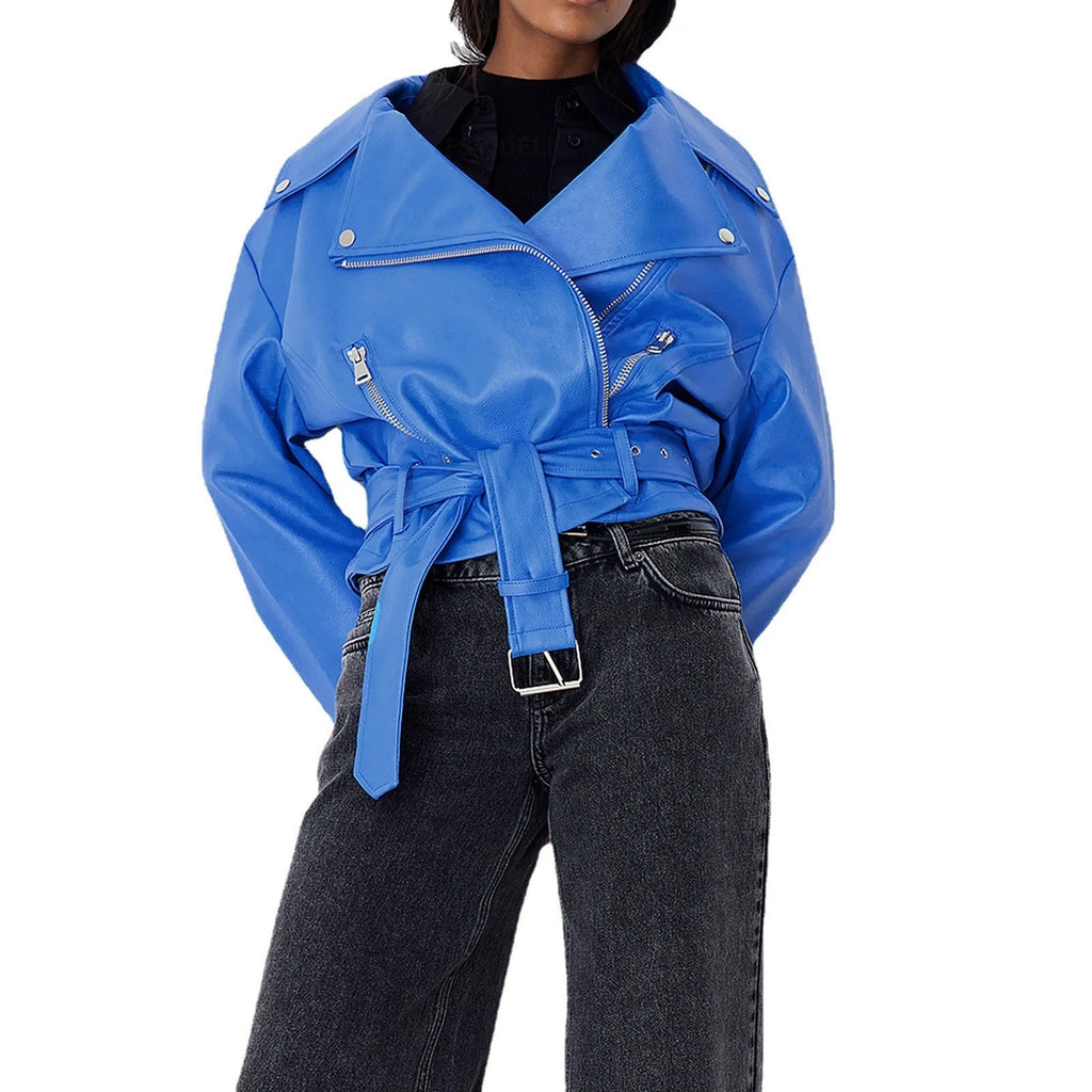 Punk-style short belt lapel jacket in polyester fibre leather, available in black, blue, and green.