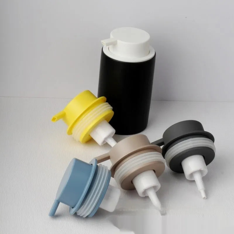 Foam pump head for facial cleanser with large pump design in Asian gold colour