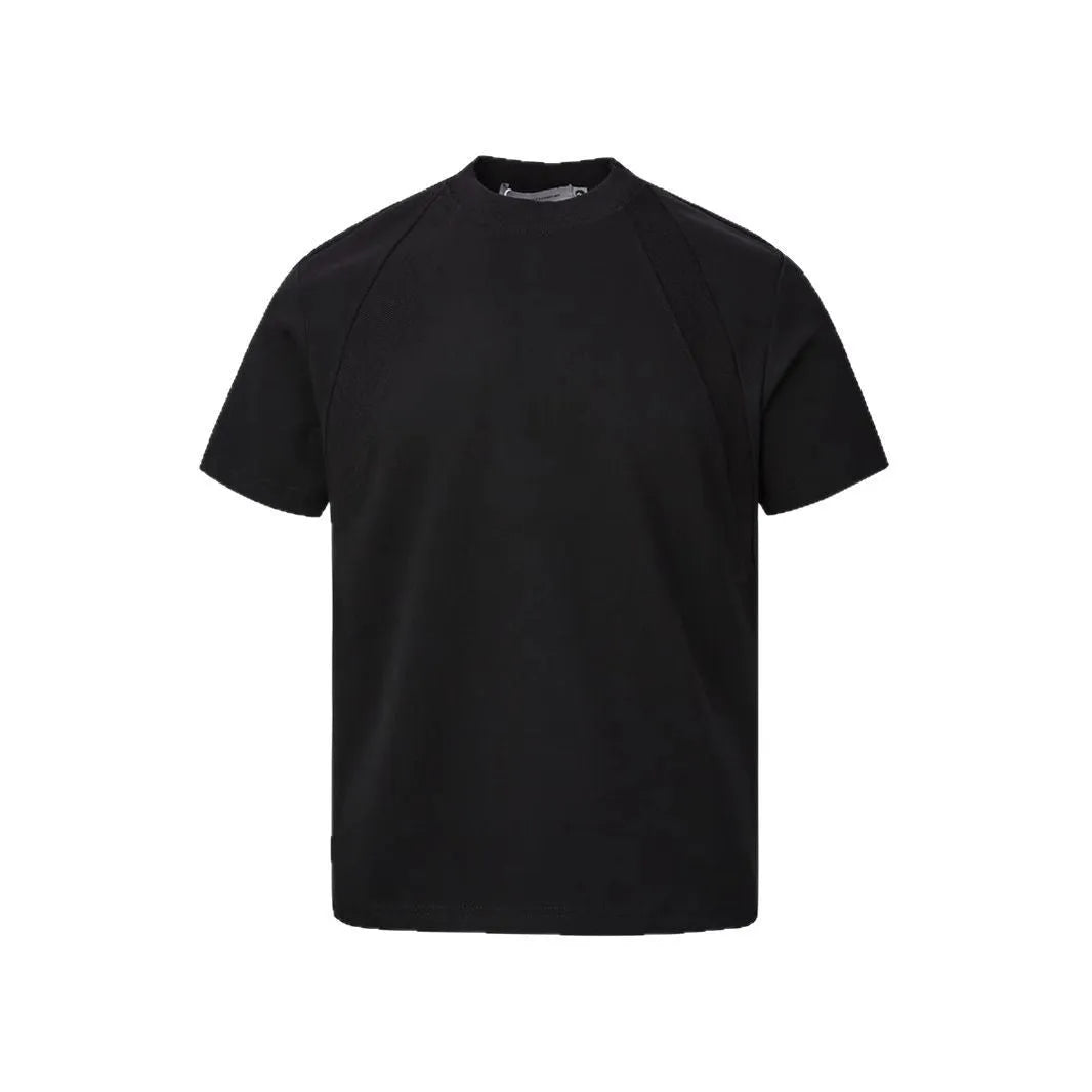 Loose fit short sleeve top with textured air layer stitching on polyester fabric.