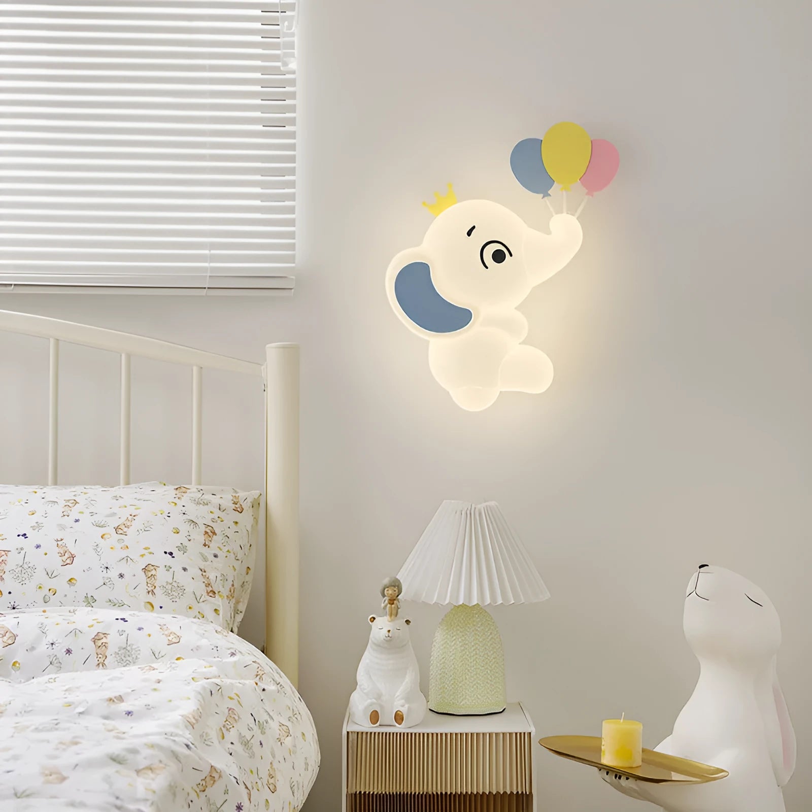 White cartoon elephant wall light with tricolour dimming, 22cm balloon elephant design, on a wall in a child's room