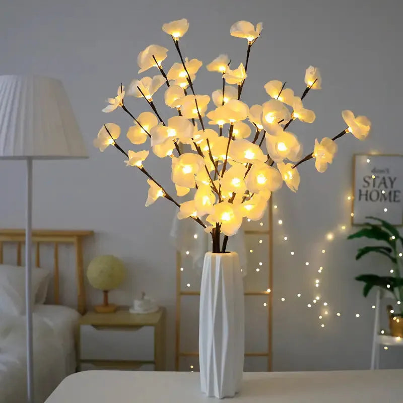 Pink fabric phalaenopsis flower on a 65 cm plastic LED branch light for bedroom decor.