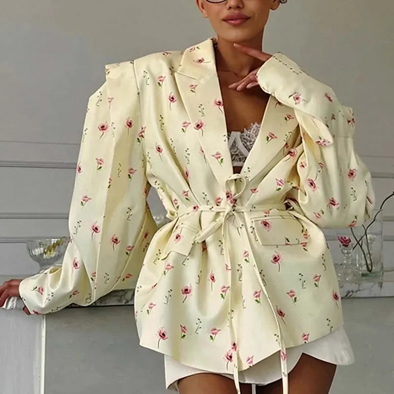 Women's suit jacket with lace-up waist detail in polyester fabric, available in multiple colours