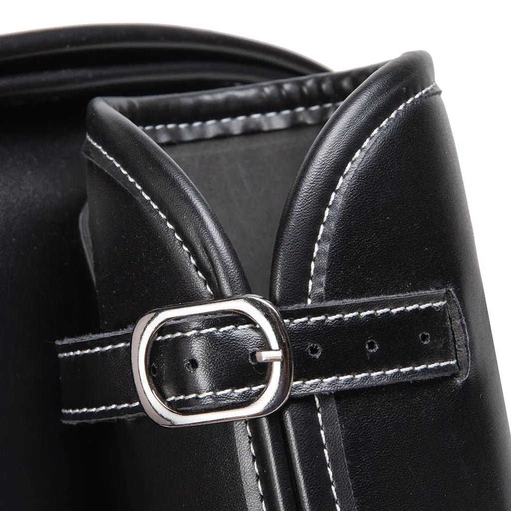 Dark punk motorcycle side bag with tail coded lock on cruiser motorcycle