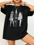 A loose-fitting unisex cotton T-shirt on a hanger, shown in one of its available colours.