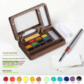 Mini walnut wood watercolour paint box for artist pigment sets.