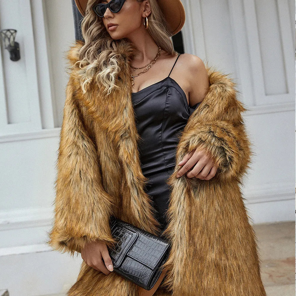 Yellow women's long faux fur coat with a loose casual fit and regular sleeves.
