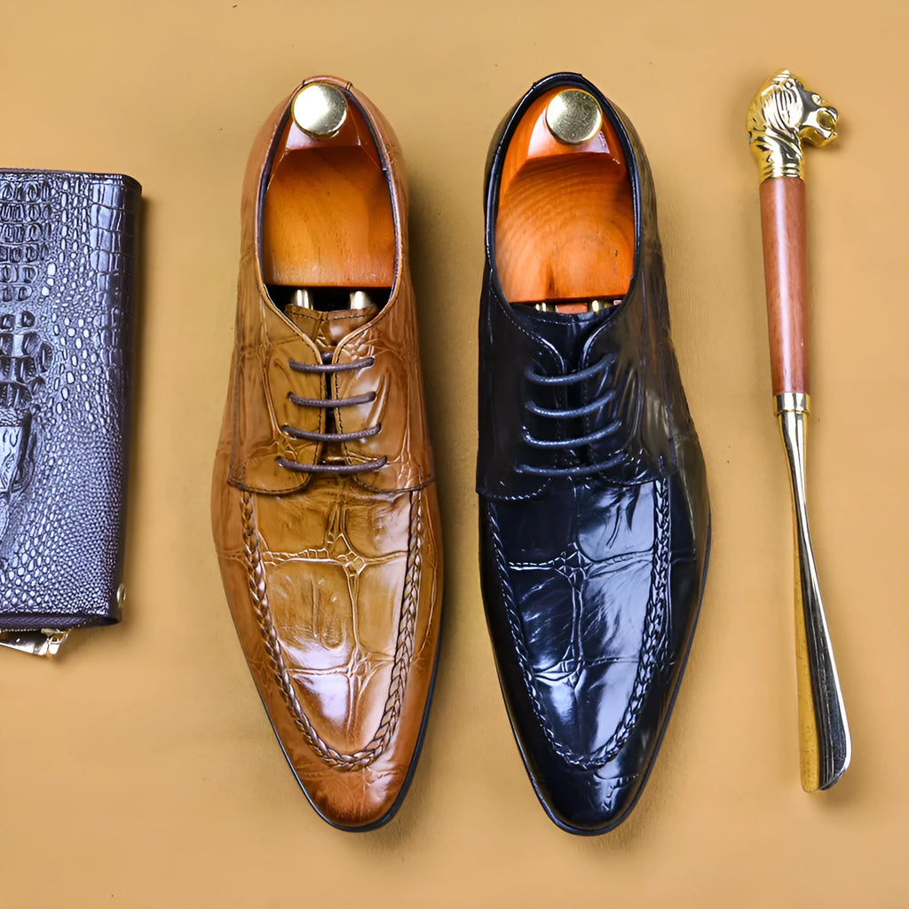 Men's black Korean-style leather formal shoes with alligator pattern and metal horse bit buckle on a rubber sole.