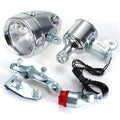 Silver bicycle dynamo generator light modification kit showing mounting bracket and wiring connections